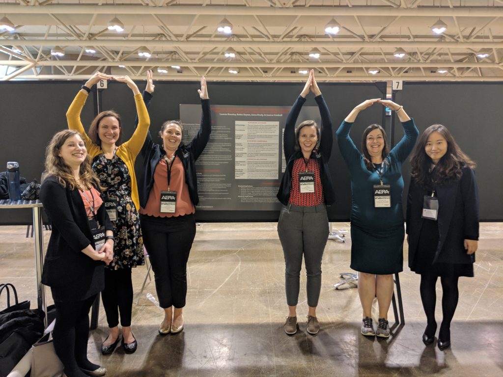 Graduate and staff researchers at a poster session. O-H-I-O!